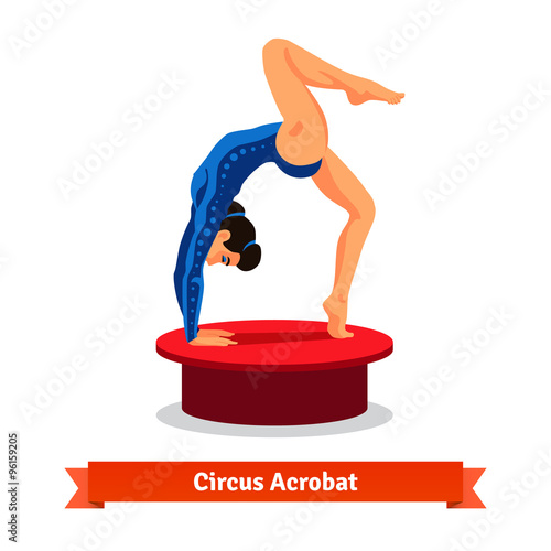 Beautiful circus acrobat performs gymnastic bridge