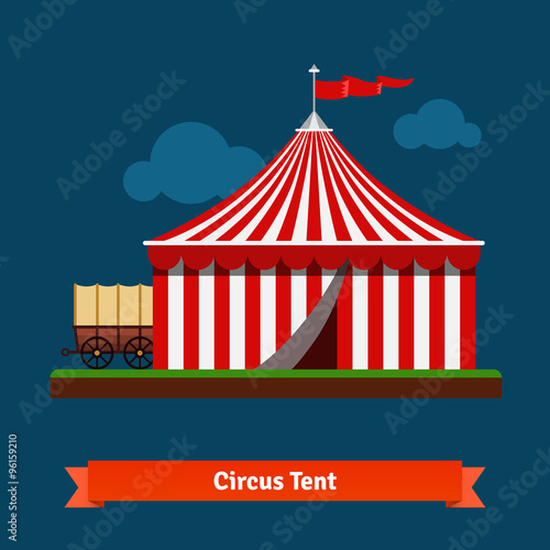 Open circus striped tent with wagon wheel