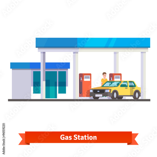 Gas station with man fuelling car