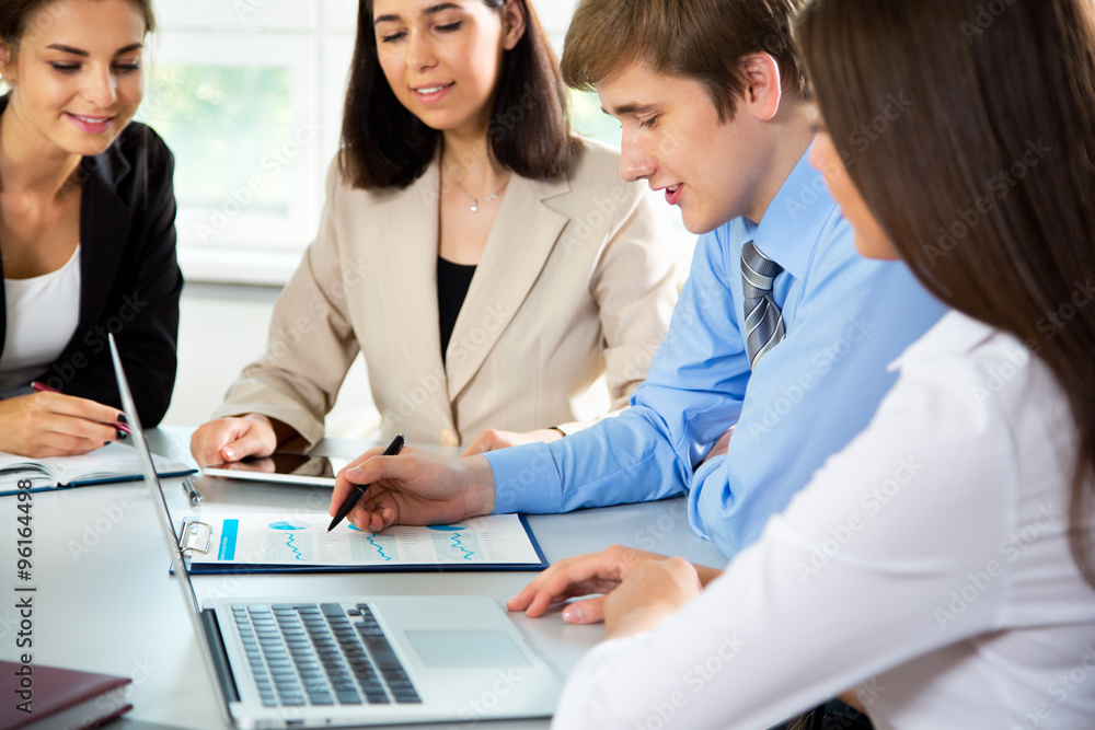 Businesspeople in a meeting at office Businesspeople in a meeting at office