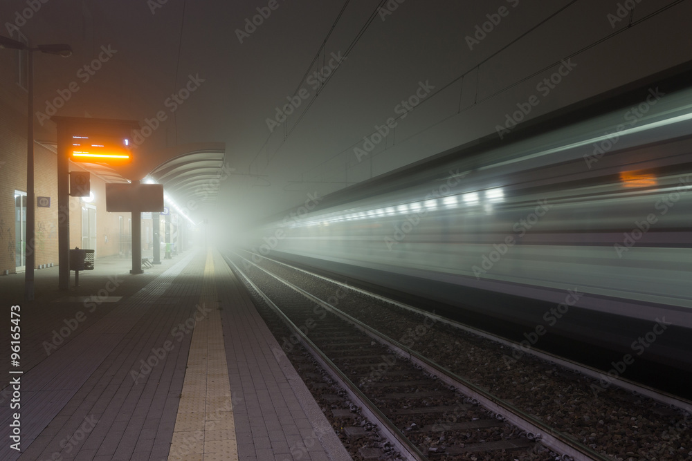 Railway station in the fog