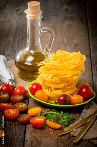 Italian Pasta with colorful tomatoes and olive oil