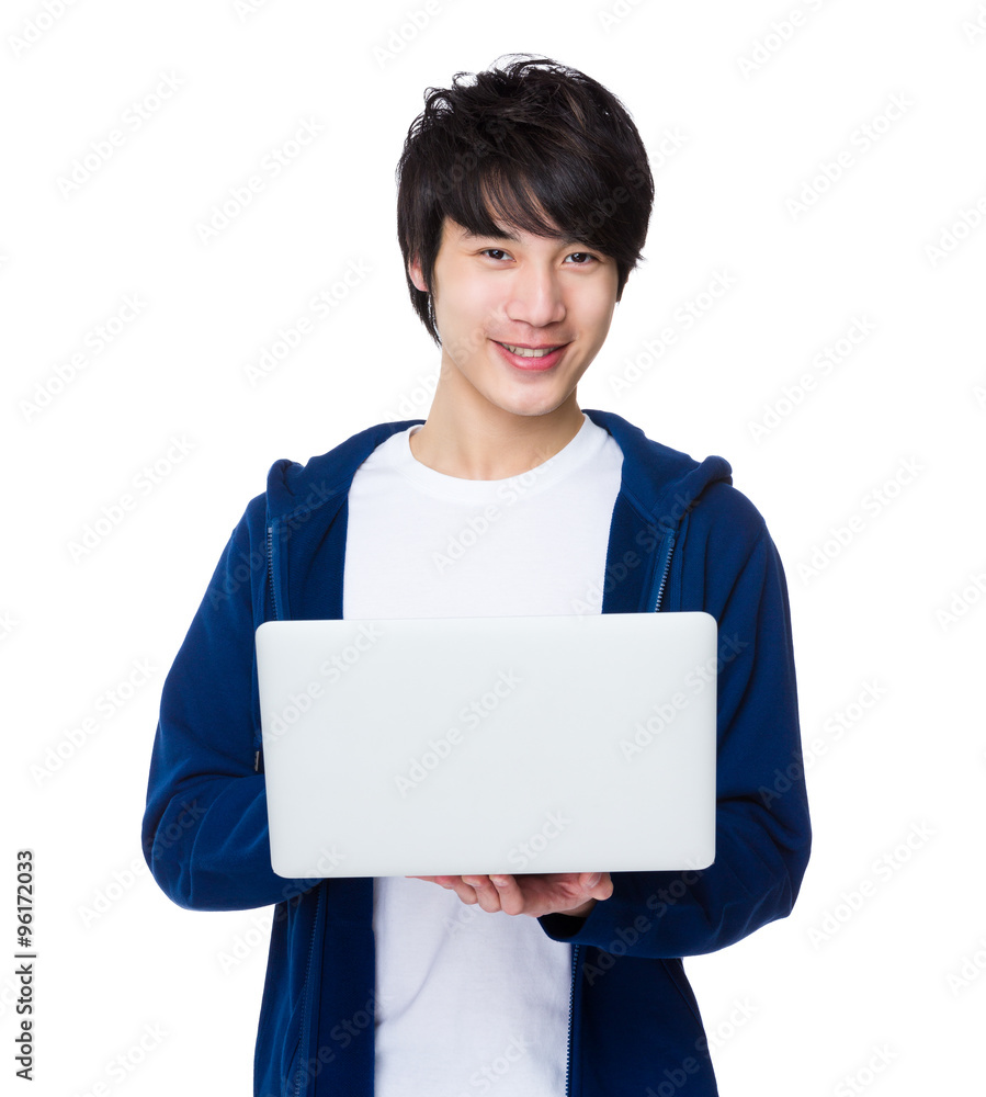 Asian Young Man working with laptop computer