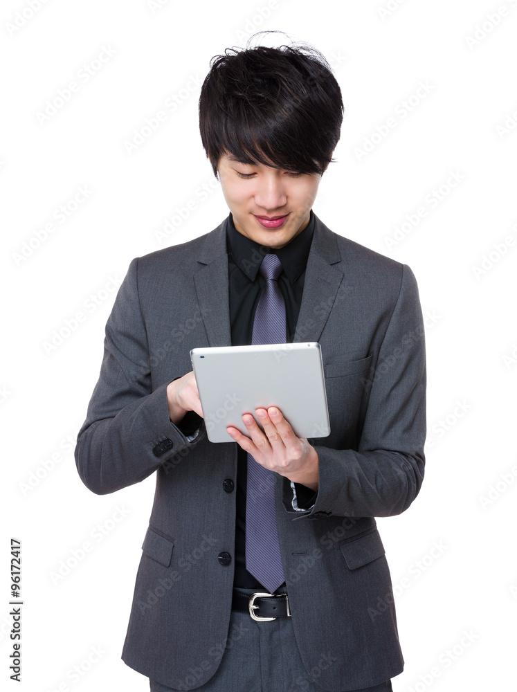 Young Businessman working with tablet pc Young Businessman working with tablet pc