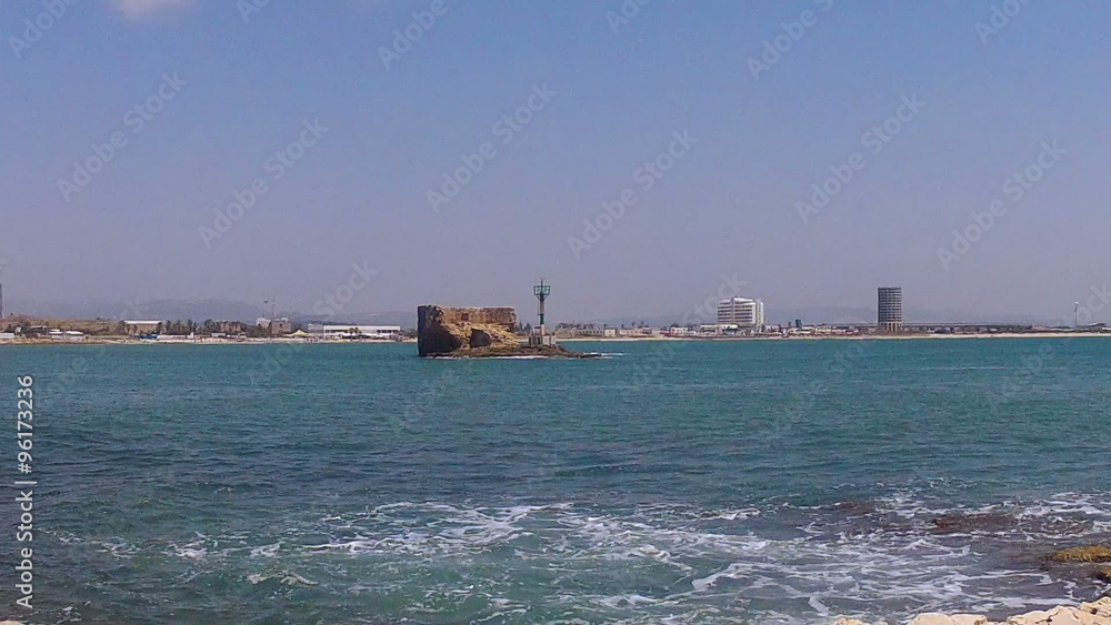 Lighthouse in the port Akko (Acre)/Old port Akko (Acre), Israel Lighthouse in the port Akko (Acre)/Old port Akko (Acre), Israel