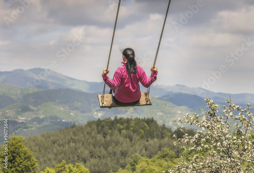 girl swinging