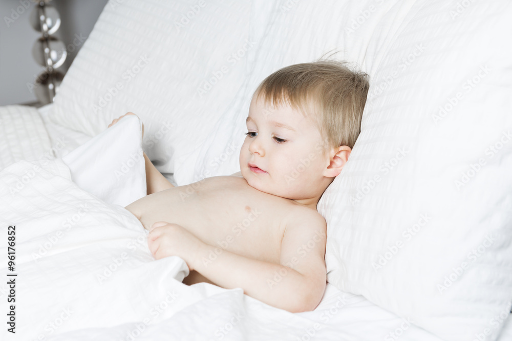 Healthy Lifestyle of young little children boy on bed Healthy Lifestyle of young little children boy on bed