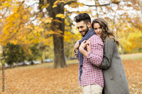 Young couple in the autumn park