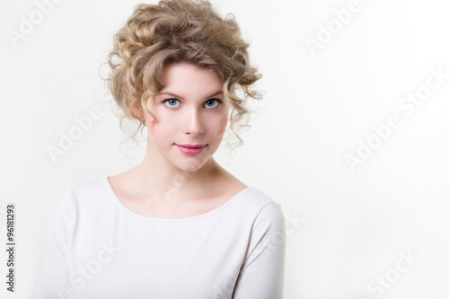 Woman with curly hair.