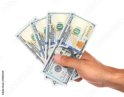 Hand with dollars isolated on white
