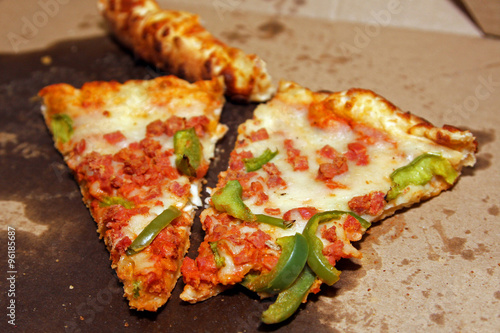 Принти на полотні Cold Leftover Pizza Slices greasy box