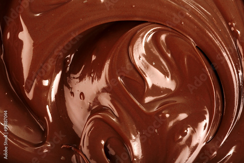 Background of melted milk chocolate, close-up
