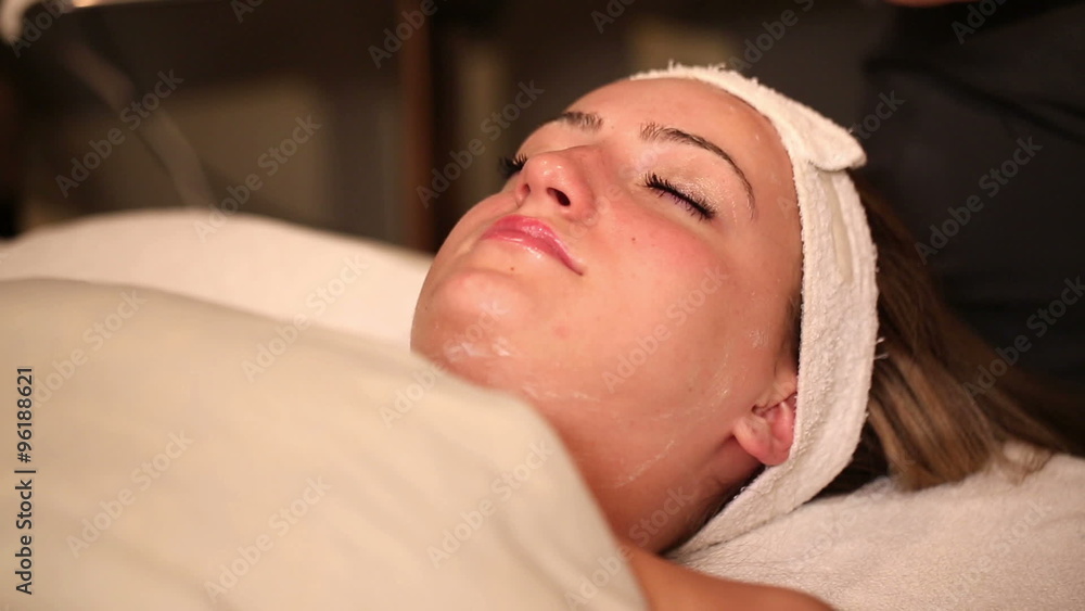 Cleaning Face with Towel in Spa. a spa employee soaks a towel in hot water dish, then cleans off face of female client.
Cleaning Face with Towel in Spa. a spa employee soaks a towel in hot water dish, then cleans off face of female client.