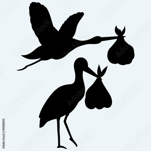 Stork with baby. Isolated on blue background. Vector silhouettes