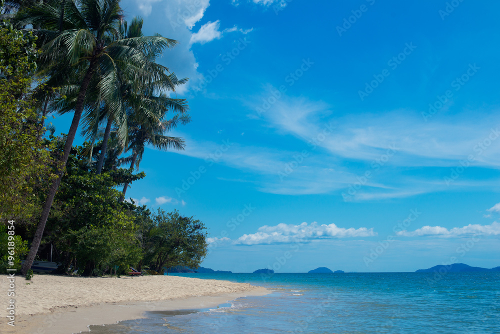 tropical beach with white sand and turquoise water in Thailand