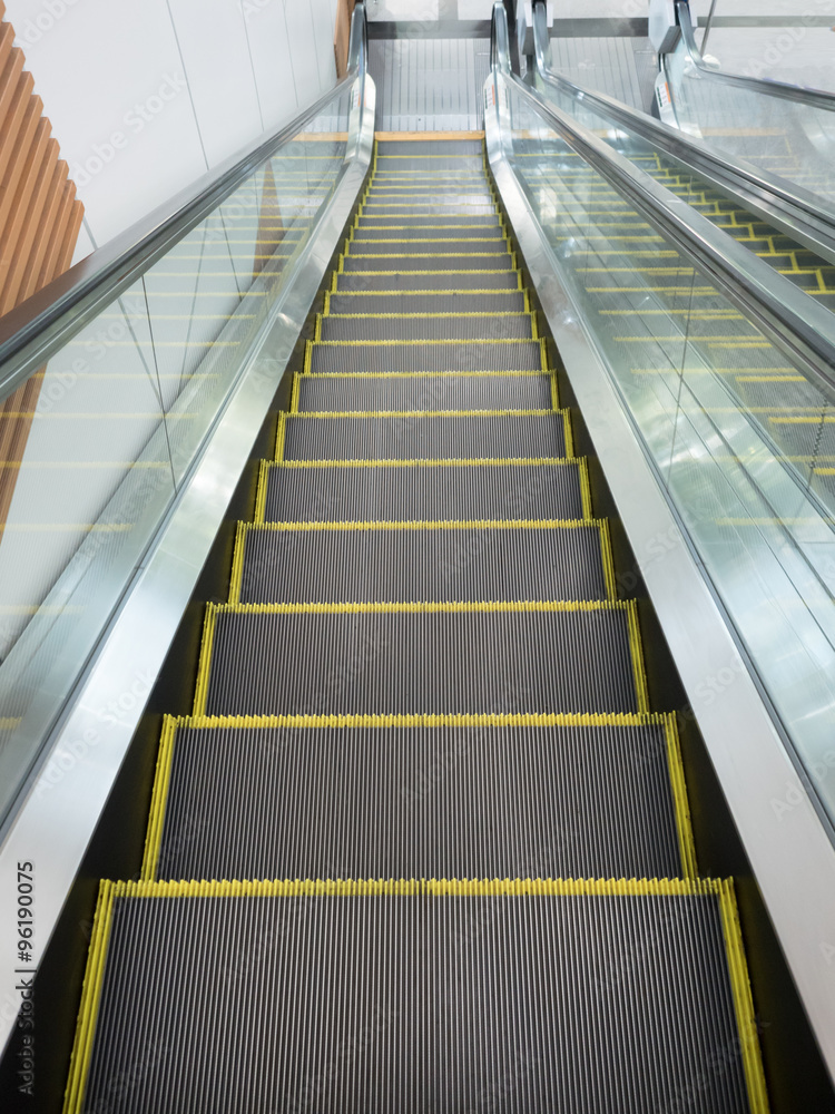 escalator,Up and down escalators in public building.,escalator i