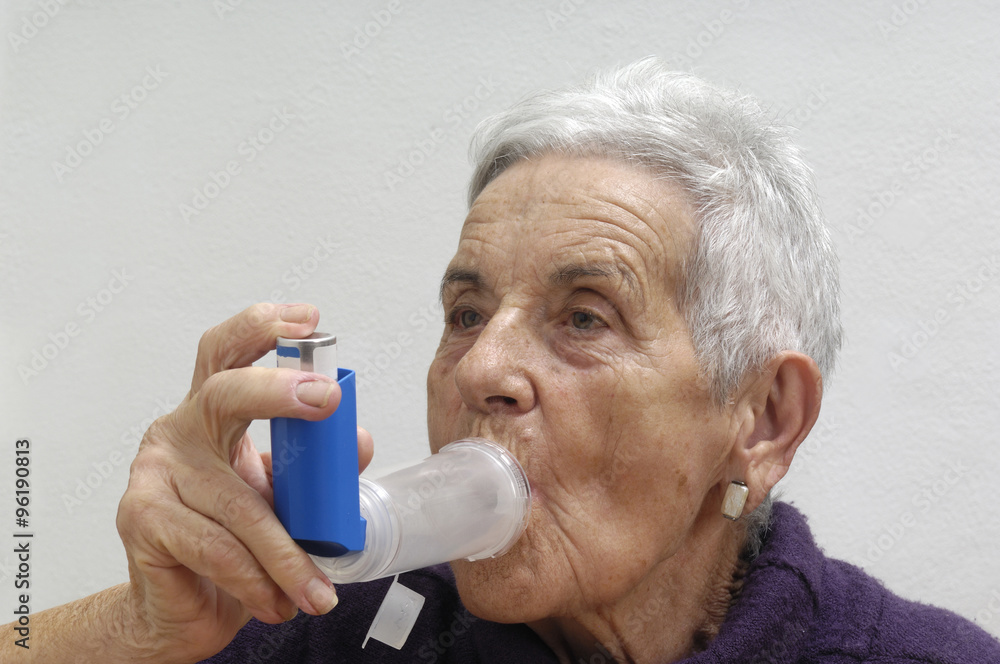 old woman with an inhaler