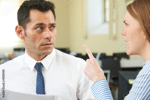 Quadro em tela Aggressive Businesswoman Shouting At Male Colleague