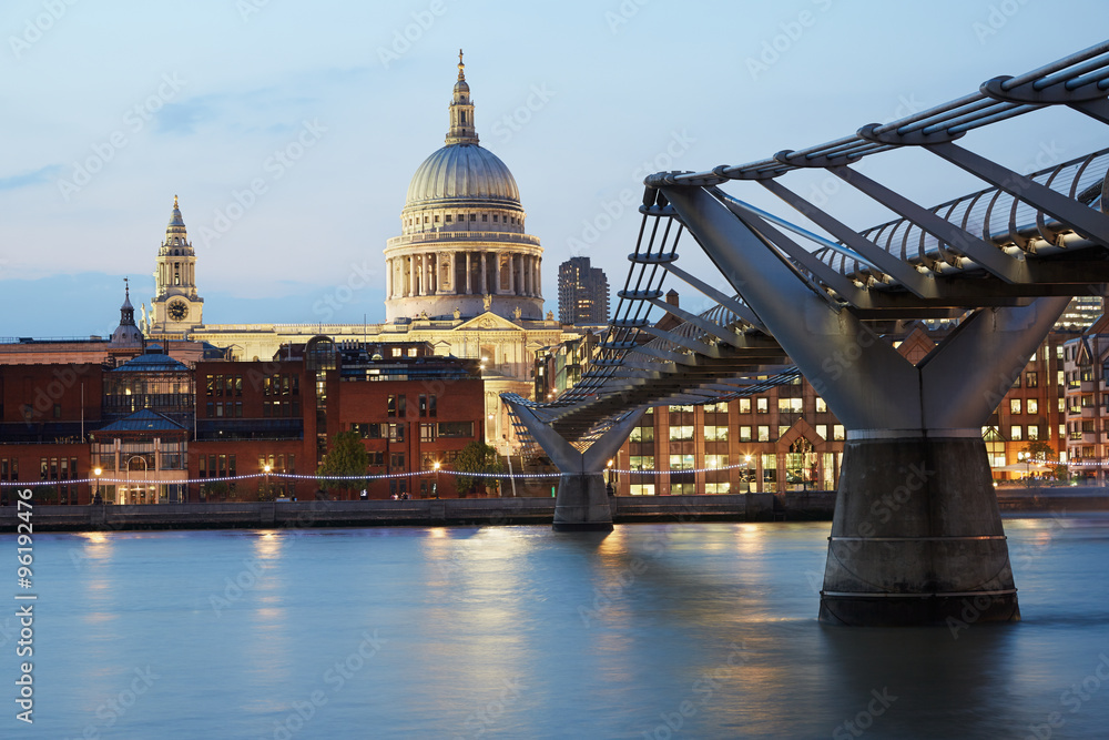 St Paul's cathedral and Millennium bridge in London, evening