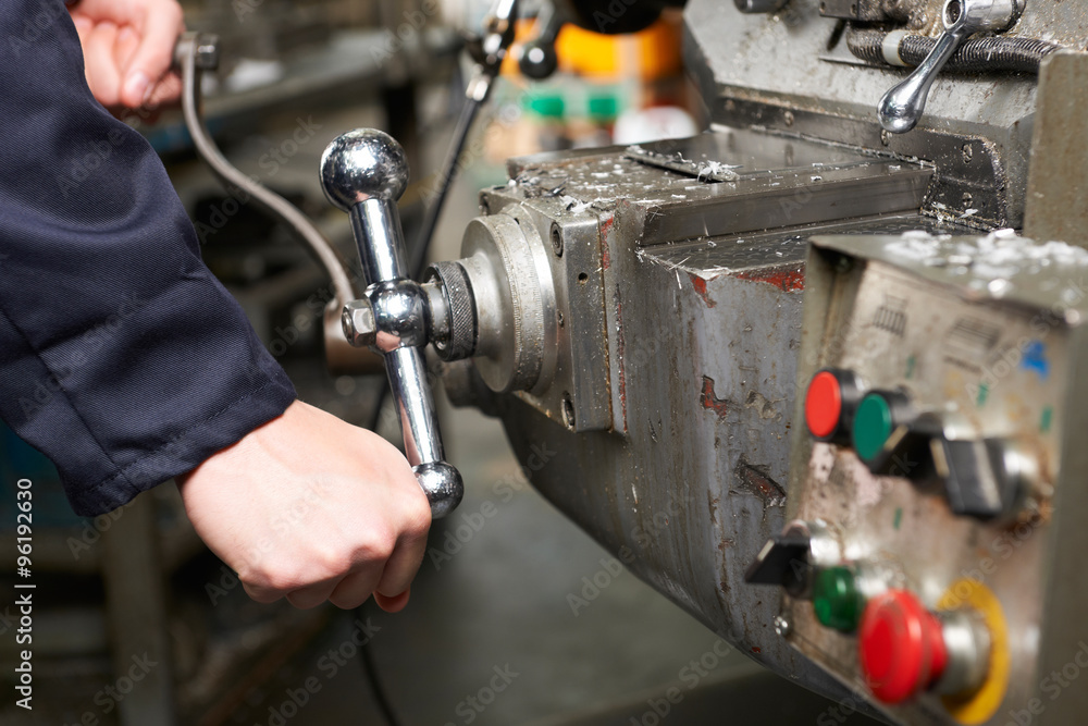 Detail Of Engineers Hands Operation Controls On Lathe Detail Of Engineers Hands Operation Controls On Lathe