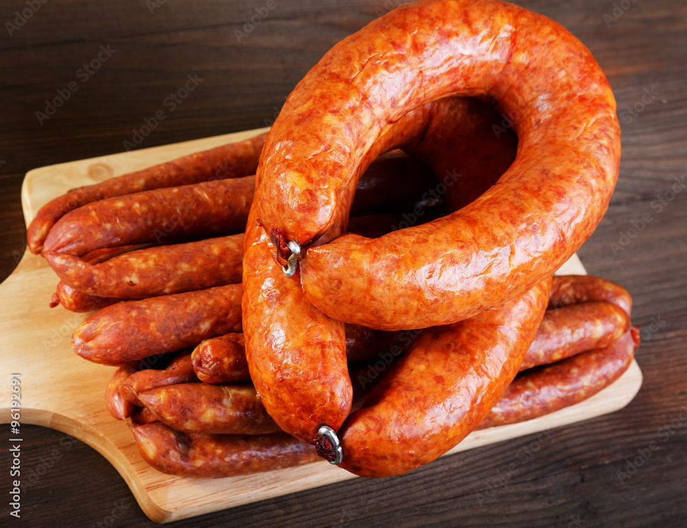 Smoked sausage on a kitchen table Smoked sausage on a kitchen table