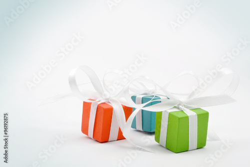 Gifts for Christmas or a birthday - three colourful packages