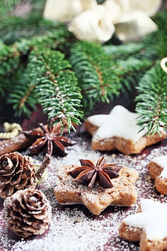 Christmas cookies and decoration on a rustic wooden table.Selective focus. 