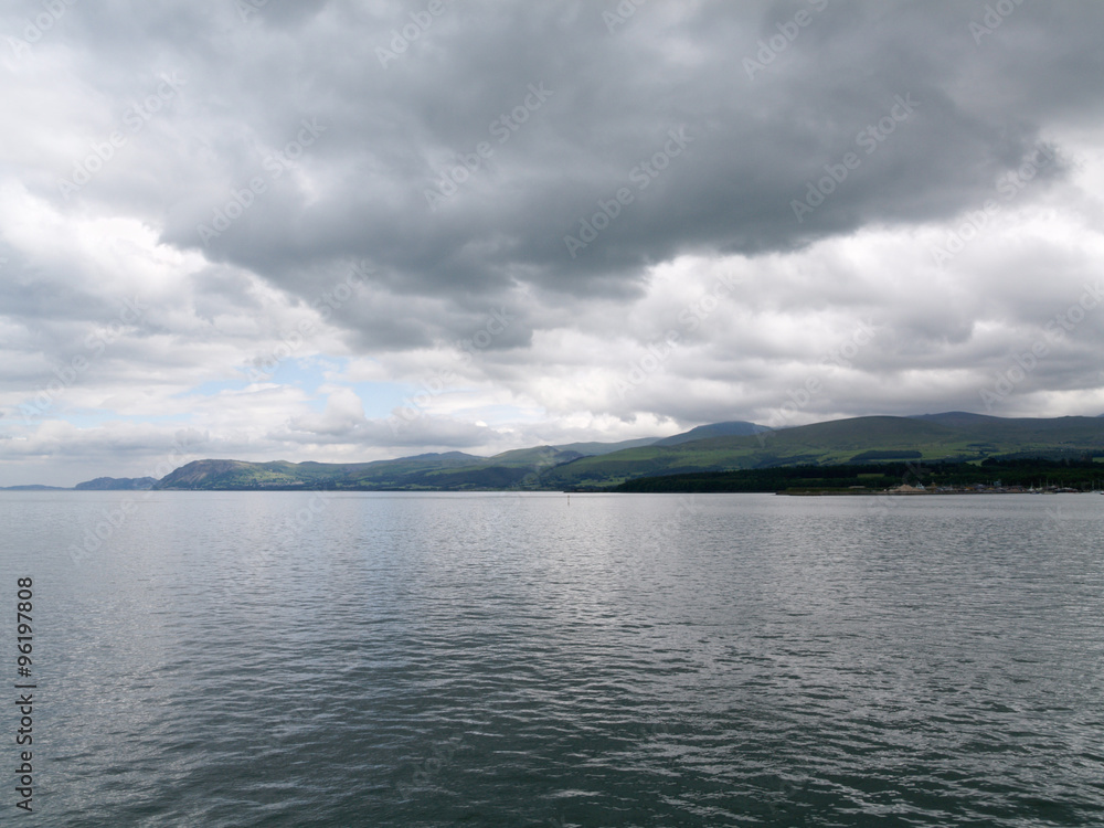 over cast cloudy day over the menai strait bangor pier north wales