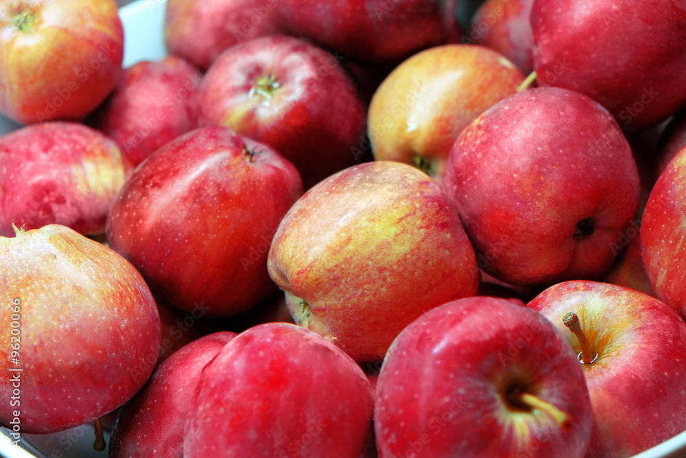 Background of ripe juicy apples, close-up Background of ripe juicy apples, close-up