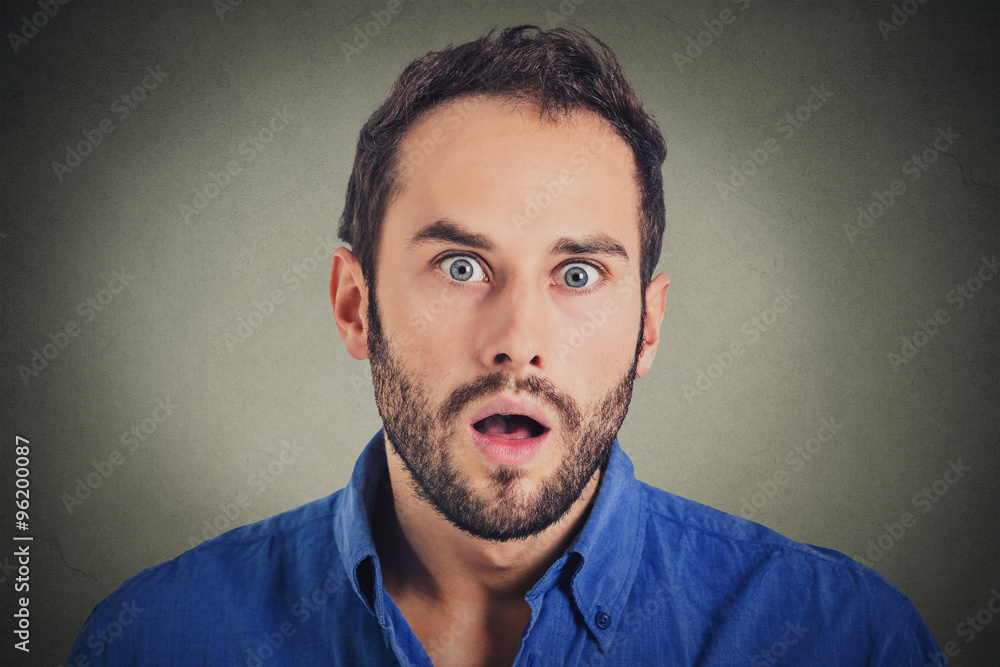 Surprise astonished man. Closeup portrait man looking surprised in full disbelief Surprise astonished man. Closeup portrait man looking surprised in full disbelief