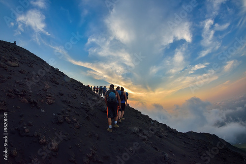 Photos Group of tourists hiking on top of the Stromboli Volcano in the Aeolian Islands,