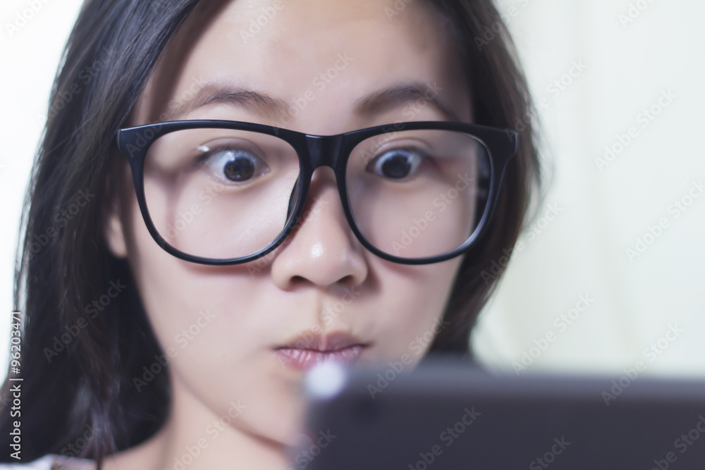 Woman use Tablet and Surprise Face Woman use Tablet and Surprise Face