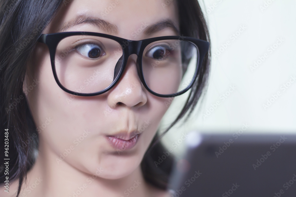 Woman use Tablet and Surprise Face Woman use Tablet and Surprise Face