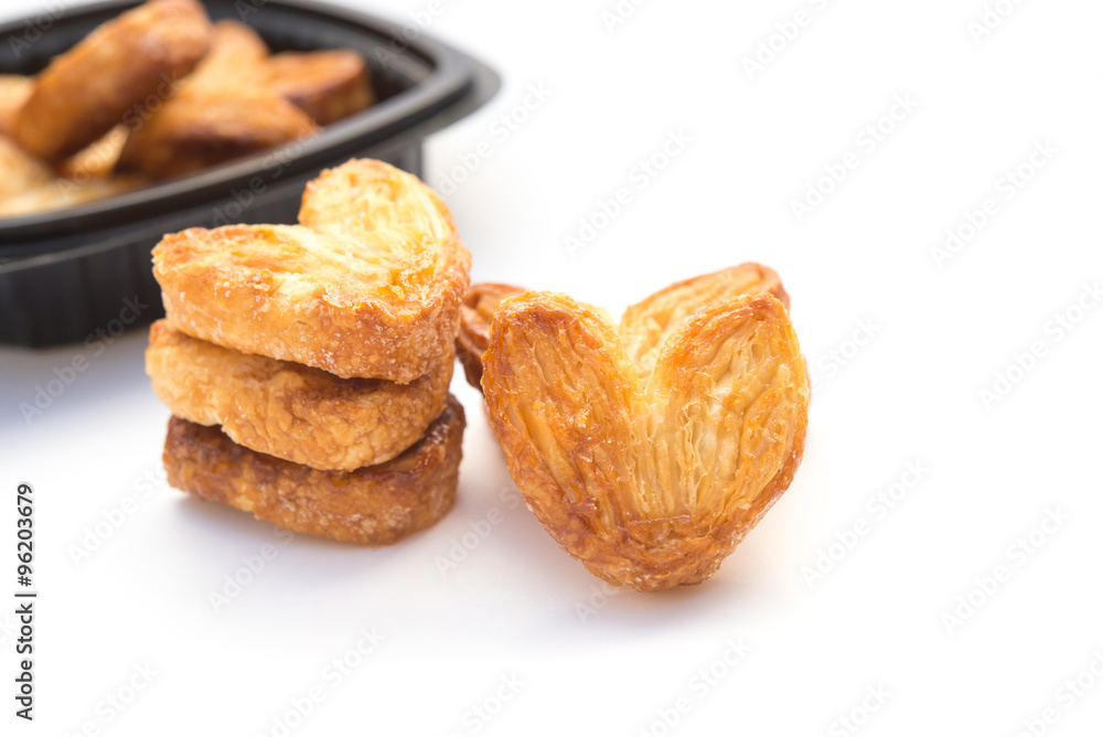 homemade heart shape sweet biscuit on a white background homemade heart shape sweet biscuit on a white background