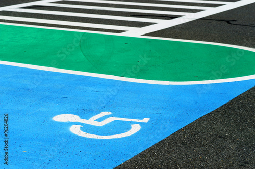 handicap sign on the road surface
