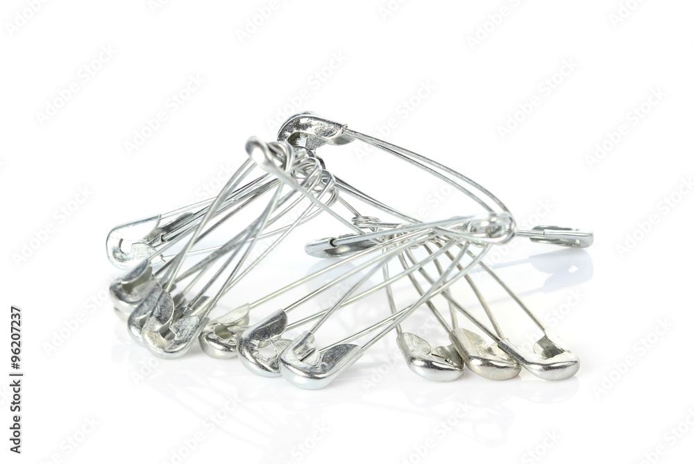 safety pins isolated on white background safety pins isolated on white background