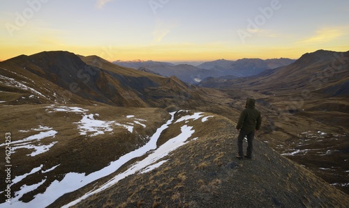 hiker observes the Alps. Savoy, France