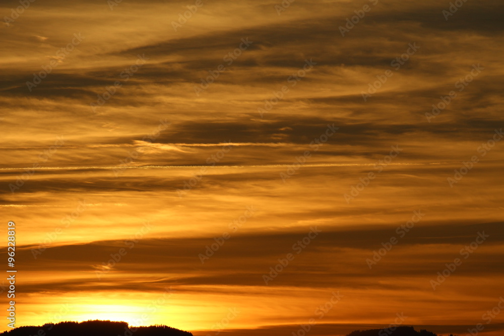 Fototapeta premium St. Gallen - Switzerland hills at sunset, taken from Schoellergasse, Bregenz in Austria.