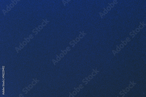 Texture of dark blue color gravel concrete wall.
