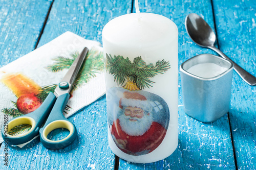 Decoupage candles for Christmas design photo