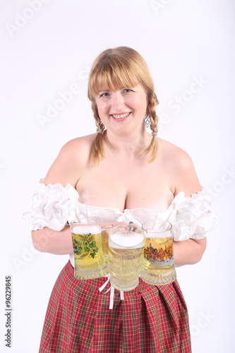 The woman has control over mugs with beer, a white background photo