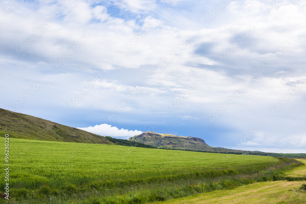 Sky with clouds and hills landscape in Iceland Sky with clouds and hills landscape in Iceland