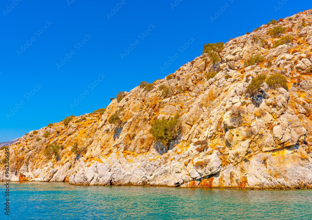 rocks near the port of Vathi village at Kalymnos island in Greece