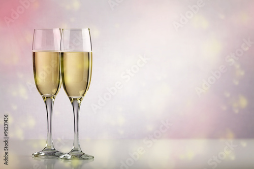 Two champagne glasses with copy space