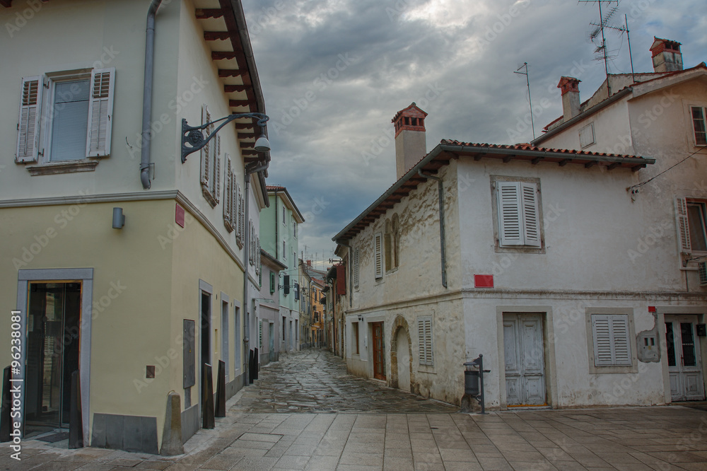 Old town street with store in Koper in Slovenia