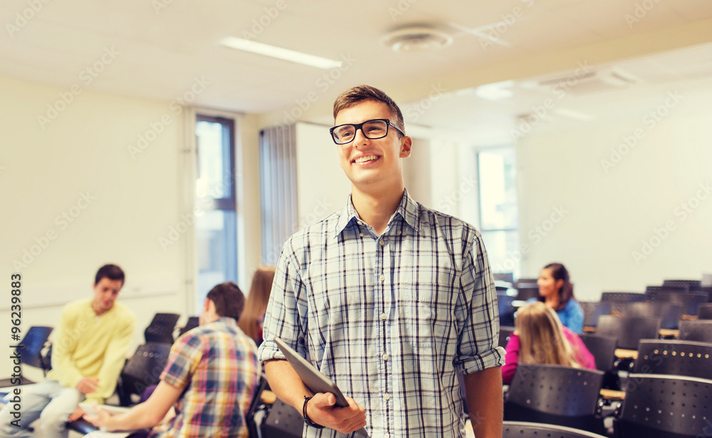 Naklejka premium group of smiling students in lecture hall