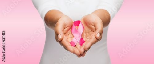 Wallpaper Mural hands holding pink breast cancer awareness ribbon Torontodigital.ca