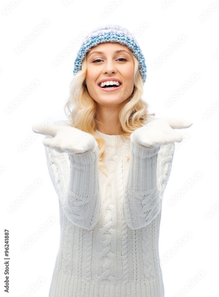 woman in winter heat showing empty palms woman in winter heat showing empty palms