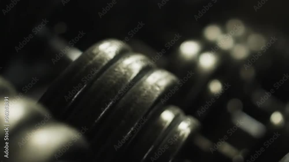 Transition shot of exercise equipment and rope in gym Transition shot of exercise equipment and rope in gym