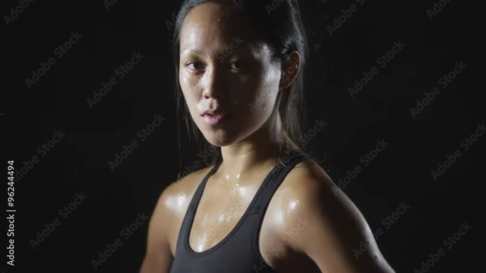 Portrait of active fitness woman sweating from workout